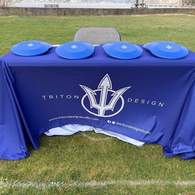 Triton Design table cover and custom promotional frisbee giveaways